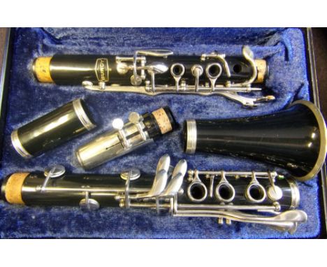 A Bundy five section clarinet : contained in a fitted carrying case.