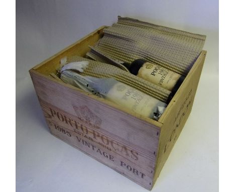 A case of Porto Pocas 1985 Vintage port: in its wood case.