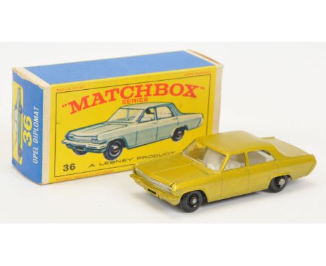 Matchbox Regular Wheels 36c Opel Diplomat - Stannard Code 2 - metallic gold body with silver grille, chrome engine, clear win