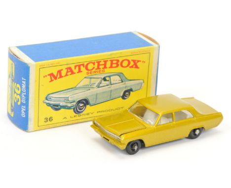 Matchbox Regular Wheels 36c Opel Diplomat - Stannard Code 4 - metallic gold body with silver grille, chrome engine, white int