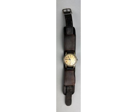 A WORLD WAR II ARMY WATCH WITH ORIGINAL STRAP