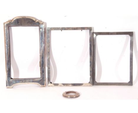 Mixed Lot: two rectangular silver photograph frames (lacking easel backs), both Birmingham hallmarked, together with a furthe