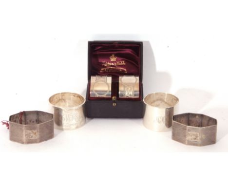 Mixed Lot: three pairs of silver napkin rings to include a pair of floral decorated examples, London 1893, maker's mark JNM, 