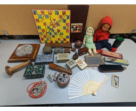 A mixed lot to include vintage dolls, games, treen and other boxes, Masonic medal and other items, along with a  barometer A/