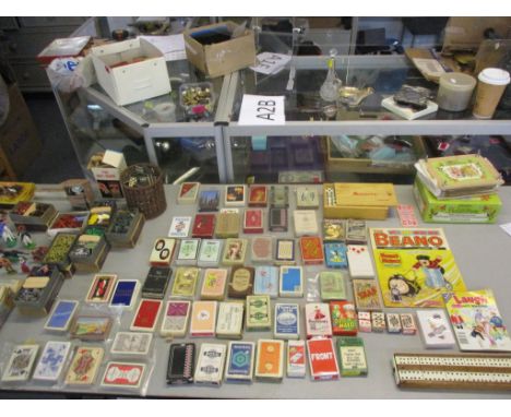 A mixed lot to include playing cards, bone dominoes, toy figures such as cowboys, soldiers, pirates and othersLocation: 