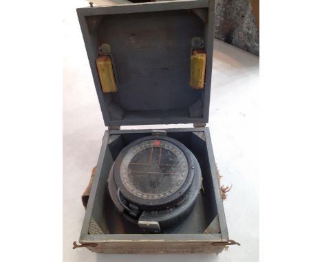 A naval compass in wooden caseLocation: RAF 