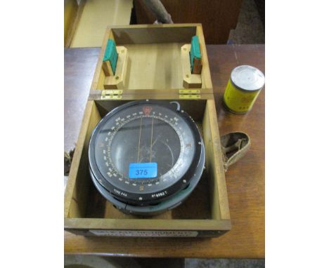 A boxed aircraft compass type P4A serial number 6563T, and a vintage tin Location: 