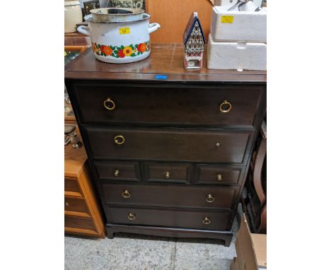 A Stagg chest of five drawers on bracket feet 112cm x 82cm x 47cm Location: 
