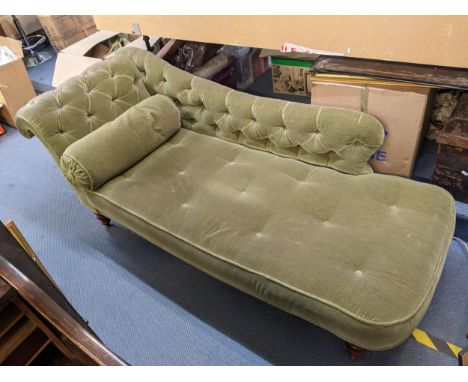 A Victorian green button back upholstered chaise longue and on turned legs, 76cm x 188cm Location: 