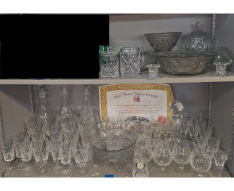 A mixed lot of glassware to include decanters, mixed wine, brandy glasses, jars, bowls and others, along with a crystal Water