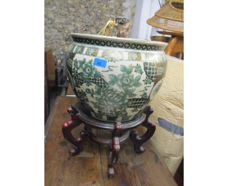 A contemporary Chinese porcelain goldfish bowl planter decorated with five carp and river foliage to the inside, the exterior