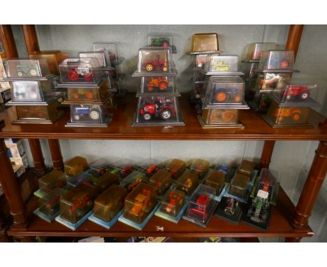 Large collection of miniature tractor models 