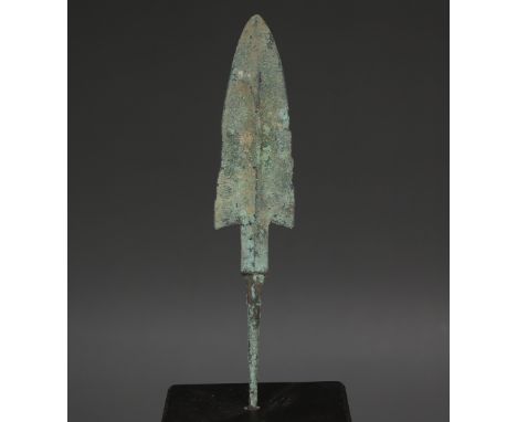 ITEM: ArrowheadMATERIAL: BronzeCULTURE: Elamite, Middle periodPERIOD: 1200 - 900 B.CDIMENSIONS: 137 mm x 26 mmCONDITION: Good