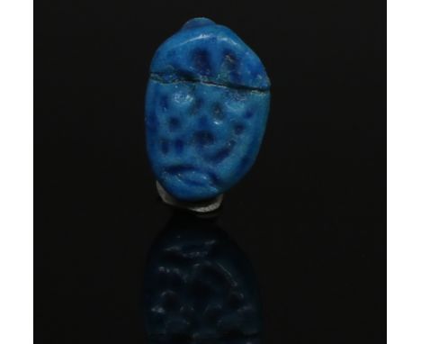 ITEM: Ring fragment, Pharaoh AyMATERIAL: FaienceCULTURE: EgyptianPERIOD: Amarna period, 1325 B.CDIMENSIONS: 17 mm x 11 mmCOND