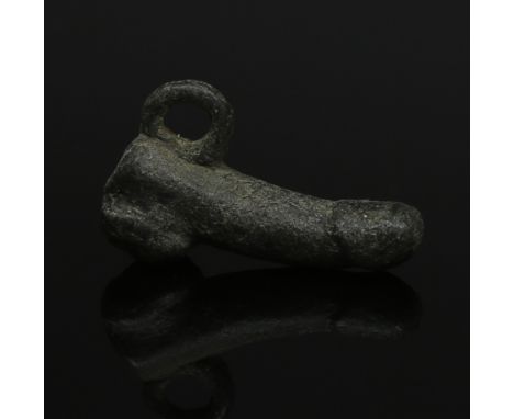 ITEM: Phallic amuletMATERIAL: BronzeCULTURE: RomanPERIOD: 1st - 3rd Century A.DDIMENSIONS: 15 mm x 7 mm x 25 mmCONDITION: Goo