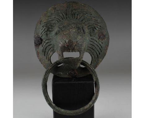 ITEM: Handle with lion's maskMATERIAL: BronzeCULTURE: RomanPERIOD: 2nd - 4th Century A.DDIMENSIONS: 160 mm x 110 mmCONDITION: