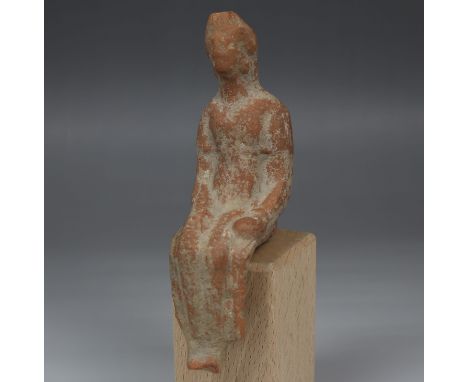 ITEM: Statuette of a seated womanMATERIAL: PotteryCULTURE: Greek, Hellenistic periodPERIOD: 3rd - 1st Century B.CDIMENSIONS: 