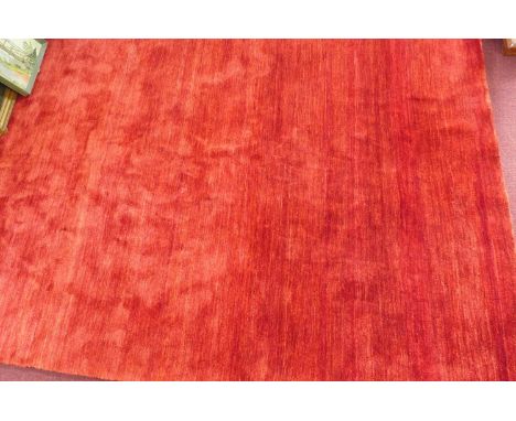 An Indian woolen Gabbeh carpet, red ground, with 100,000 knots, 335 x 245cm 