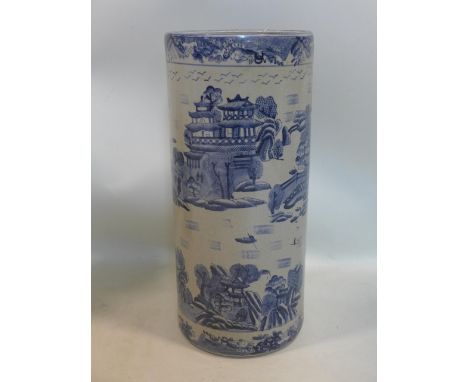 An early 20th century Chinese porcelain stick stand, hand-painted in blue and white with Oriental vistas, H: 46cm 