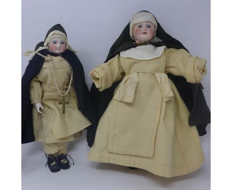 A German bisque nun doll, wearing tunic, cloak and rosary beads, marked '4a' to neck, H.39cm, together with another German nu