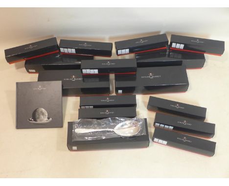 A collection of boxed unused silver plated cutlery by Sonja Quandt: 5 individually boxed large serving spoons L: 28cm each an
