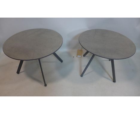 A pair of tile top garden tables, raised on splayed legs, H.42cm Diameter 59cm (2) 