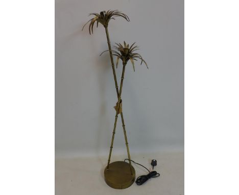 A contemporary gilt two branch floor standing lamp in the form of palm trees, H.126cm 
