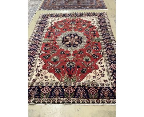 An Azarbaijan red ground carpet, 312 x 216cm. Condition - good