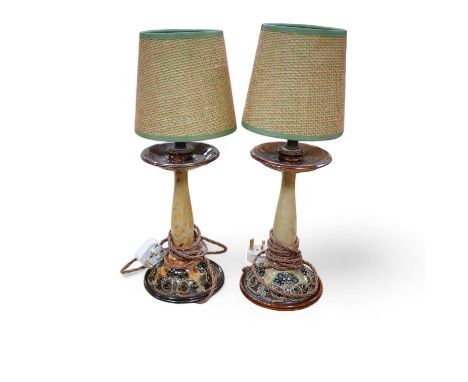 A pair of Royal Doulton stoneware 'candlestick' bedside lamps and shades, 41cm total. Condition - good, not tested