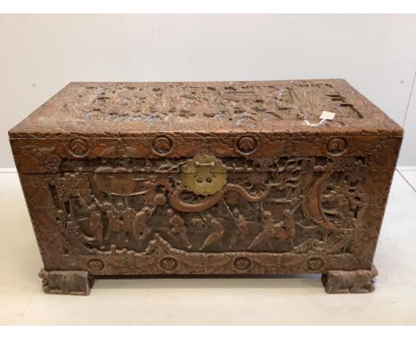 A Chinese carved camphor wood trunk, width 104cm, depth 51cm, height 57cm. Condition - fair