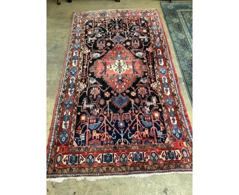 A North West Persian dark blue ground carpet, 306 x 168cm. Condition - good