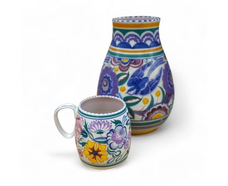 A 1930’s Poole pottery vase and a later mug, vase 25cm high. Condition - fair slight grazing to base rim of vase