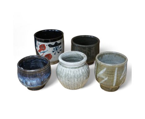 Five Japanese and European studio pottery yunomi, including an example by John Maltby, 10.5cm, together with another signed w