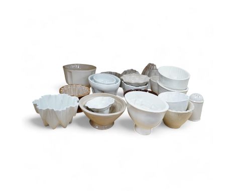 Twenty early 20th century ceramic jelly moulds, including an example by Shelley, etc. Condition - fair