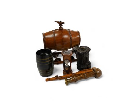 A group of treen to include a spirit barrel with turned wood spigot tap, on wheeled trolley, 17cm long, a pepper grinder, san