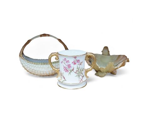 A Royal Worcester blush ivory basket, a shell dish and an ivory coloured two handled mug, 15.5cm (3). Condition - fair to goo