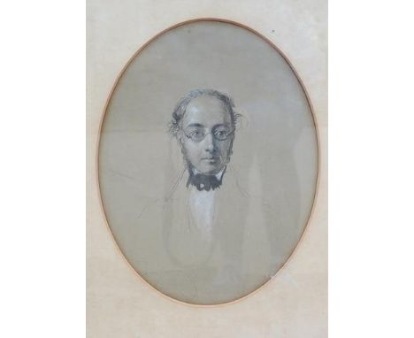 Late 19th century, oval heightened charcoal, Portrait of a gentleman, unsigned, 37 x 27cm. Condition - fair
