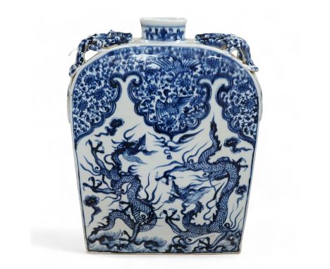 A large Chinese blue and white dragon flask, 39cm high. Condition - good