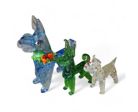 Three Murano glass dogs, largest 31cm. Condition - fair to good, some minor chipping Largest tests as uranium glass, shines g