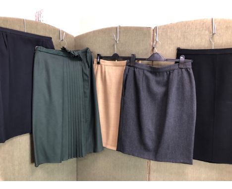 SKIRTS: A GREEN WOOL GIANNI VERSACE SKIRT SIZE 44, A DARK GREY VALENTINO SKIRT SIZE 12, A BLACK JILL SANDER SKIRT SIZE 38, A 