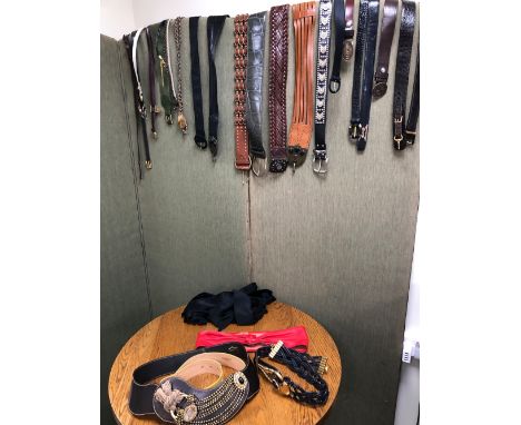 BELTS. A COLLECTION OF APPROXIMATELY 33 BELTS AND WAIST TIES TO INCLUDE, VALENTINO, BUGATTI,BMW, MAPPIN &amp; WEBB, JEAN L'IN