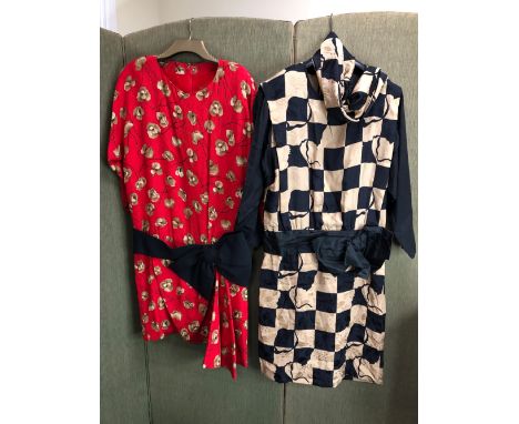 TWO 1980's STYLE DRESSES ONE GOLD AND BLACK FLORAL CHECK SHOULDER TO CUFF 54cm SHOULDER TO HEM 105cm PIT TO PIT 63cm AND A RE