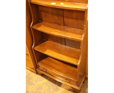 Four shelf waterfall bookcase with single lower drawer. This lot is not available for in-house P&amp;P 