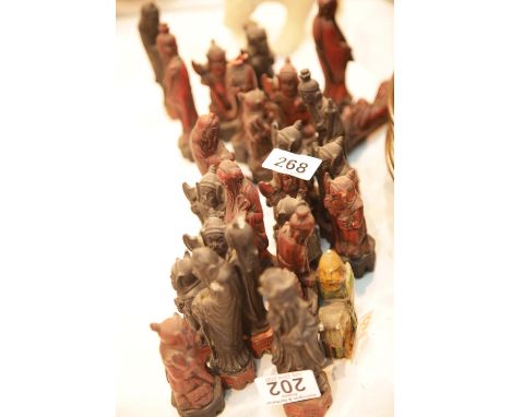 Part set of Oriental type chess pieces. P&amp;P Group 1 (£14+VAT for the first lot and £1+VAT for subsequent lots) 