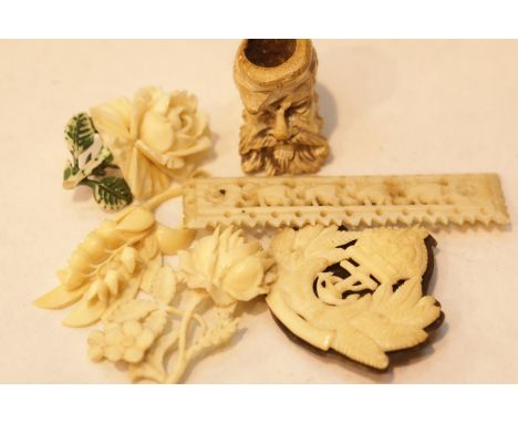 Small selection of bone carved items to include a military badge. P&amp;P Group 1 (£14+VAT for the first lot and £1+VAT for s