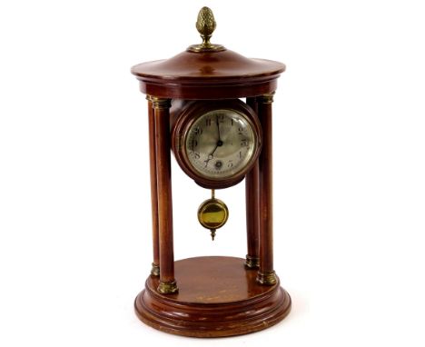 A late 19thC French portico type clock, in a wooden case, with silvered dial etc., 31cm H.