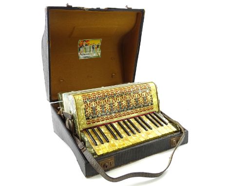A Fremielio piano accordion, in fitted case.