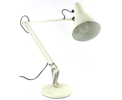 A 20thC Bauhaus style angle poise lamp in cream, the base 19cm diameter.