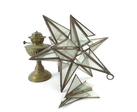 A brass oil lamp, with chimney and a star shaped hall lantern. (AF)