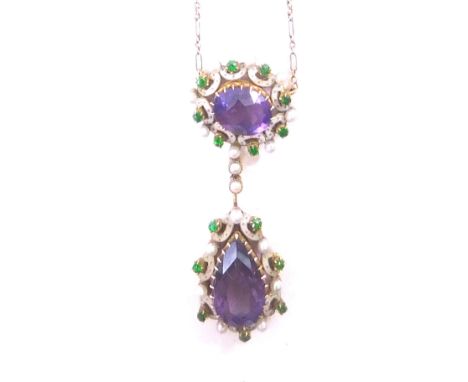 An amethyst drop necklace, with white enamel design borders, set with peridot and seed pearl, on a fine link yellow metal cha